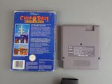 a nintendo game on the table next to the game case