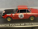 a model of a red car in a glass case