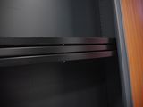 an image of a black refrigerator in a kitchen