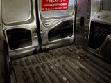 an image of a van with a red sticker on the door