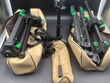 four different types of guns on the back of a truck