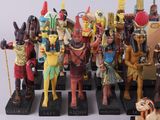many figurines of different colors and sizes on display