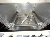 a stainless steel oven that is open on the stove