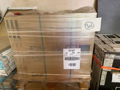 a stack of boxes sitting on top of a glass table
