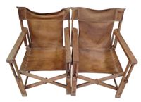 Paire de fauteuils de style metteur en scène en bois, assise…