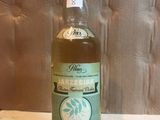 an image of a bottle of beer sitting on a table