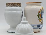 two vases sitting next to each other on a table
