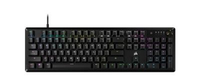 un clavier d'ordinateur posé sur une surface blanche