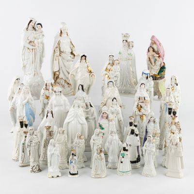 a lot of figurines that are sitting on a table