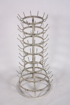an image of a metal wine rack on a white background