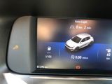 a picture of a car ' s dashboard with a digital display