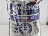 a bag of dog food sitting on a table