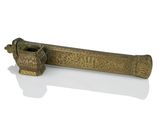 an old brass pipe with a handle on a white surface