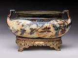an image of a large vase with a handle on a stand