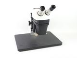 an image of a close up of a microscope on a white background