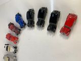 several toy cars are arranged in a circle on a white surface