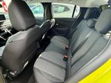 the back seats of a small car are empty and ready to be used