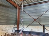 a picture of a large warehouse with a lot of wood