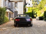 a car that is parked in front of a house