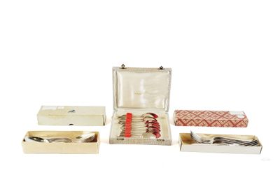 several different items in a case on a white surface