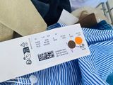 a picture of a ticket that is attached to a shirt