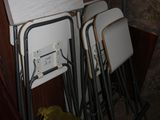 three chairs that are next to each other in a room