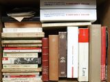 a box full of books sitting on top of a table