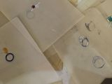 a pile of papers with rings on them on a table