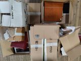 a pile of boxes that are sitting on the floor