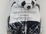 two pairs of black and white panda bear socks in a package