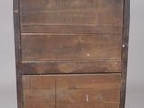 an old wooden chest of drawers with two drawers on top of it