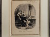 an old picture of a man sitting at a desk in a chair