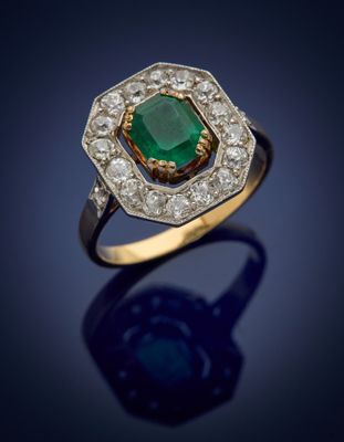 an emerald and diamond ring