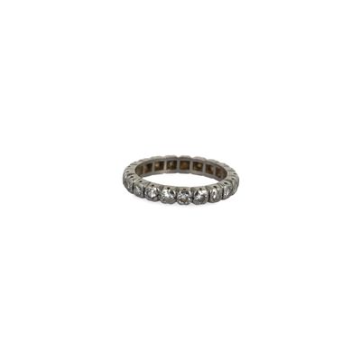 a close up of a diamond ring on a white background