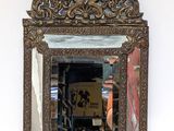 a mirror hanging on the wall in a room