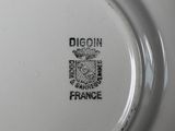 a white plate with a black and white design on it