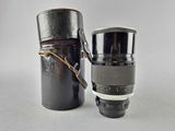 a black canister and a silver canister on a white background