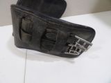 pair of black leather shoes with buckles on a white surface