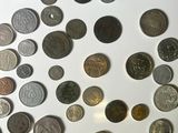 a lot of coins that are on the table