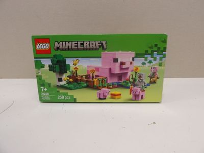 La boîte du kit Lego Minecraft est ouverte et prête à l'emploi.