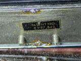 a close up of a suitcase with a label on it