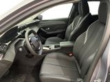 the interior of a car with a steering wheel and leather seats