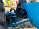 a close up of a machine that is on the ground