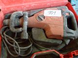 a red tool box with tools inside of it