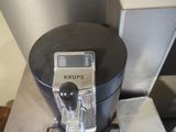 a coffee maker that is sitting on a table