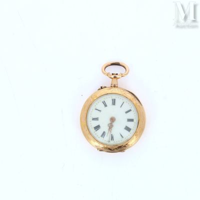 a gold pocket watch with roman numerals on the face