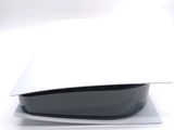 a white mouse sitting on top of a white surface