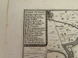 an old map of a town in the middle of a field