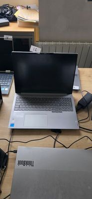 two laptops that are sitting on a table