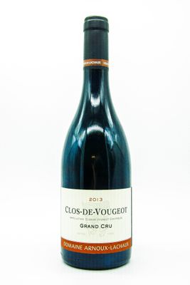 a bottle of wine that is sitting on a table